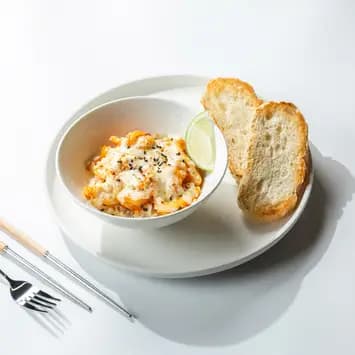 Жюльен из морепродуктов с рисом и соусом том ям